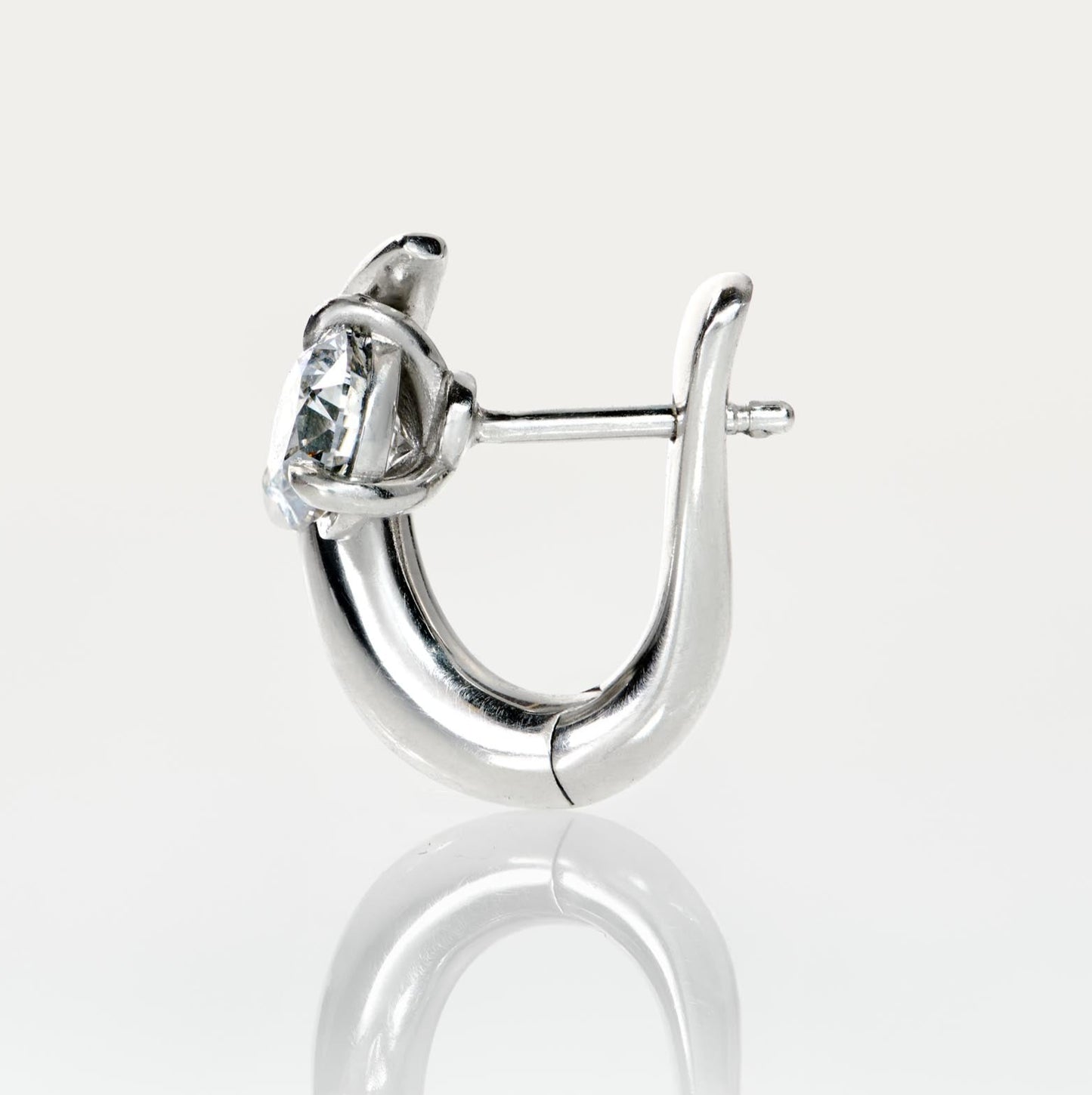 Platinum wave earring with lab grown diamond