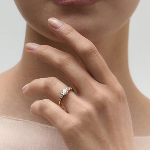 Ethical Skydiamond man-made diamond ring set in platinum, paired with matching man-made diamond earrings in platinum