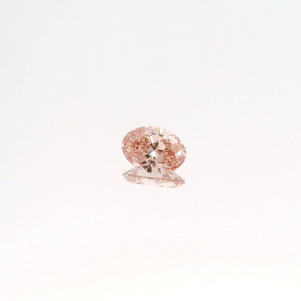 0.73 Carat Pink VVS2 Oval Diamond