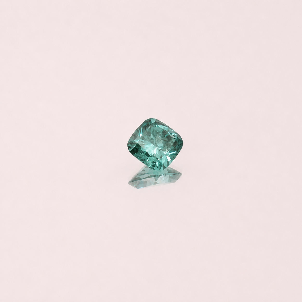 0.60ct Teal Cushion Skydiamond
