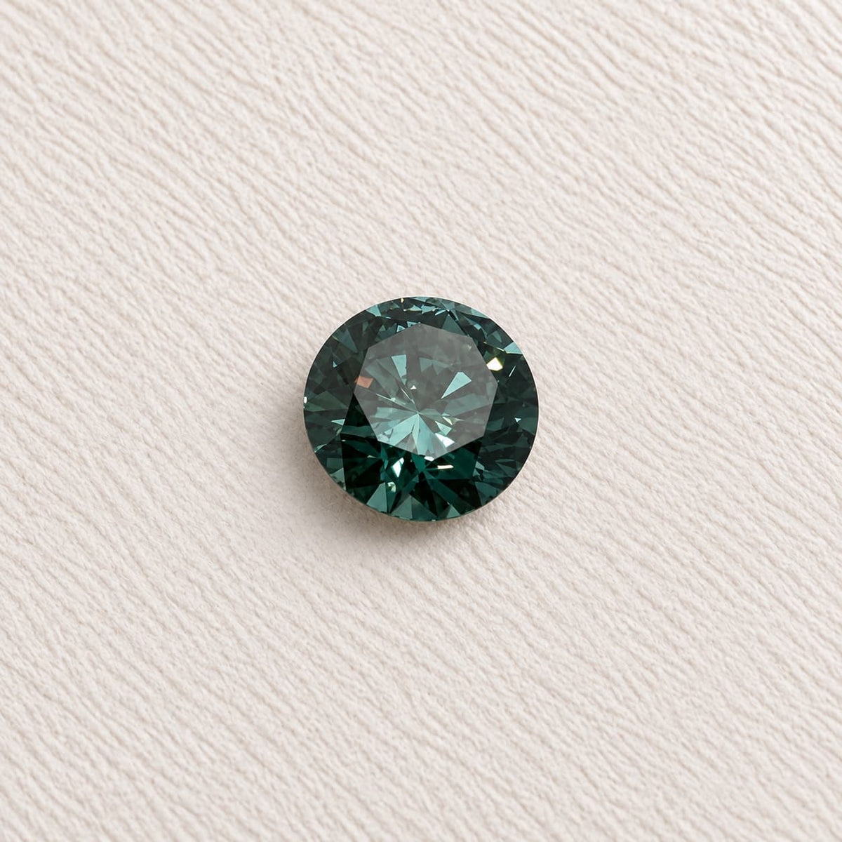 1.04ct Dark Teal SI2 Round Brilliant Skydiamond