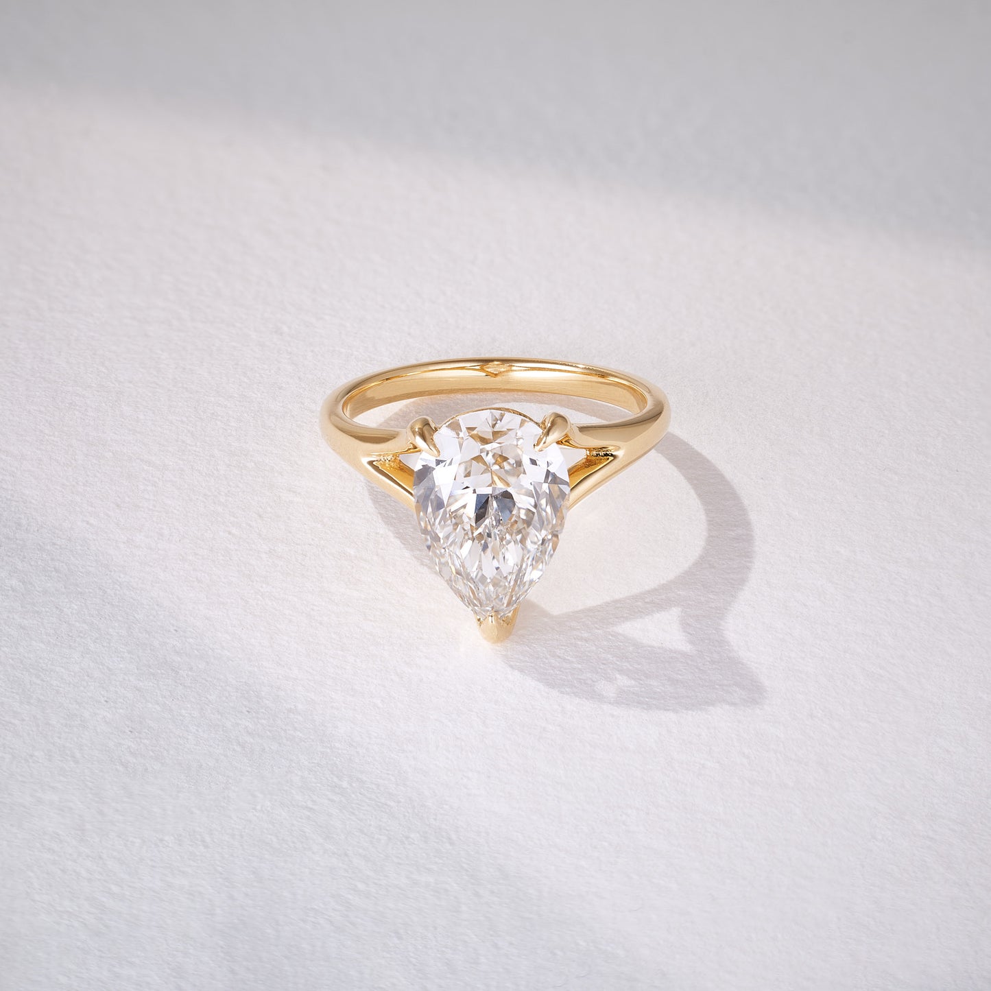 Suspended Large Pear Cut 3.5ct Diamond Ring in 18ct Recycled Yellow Gold