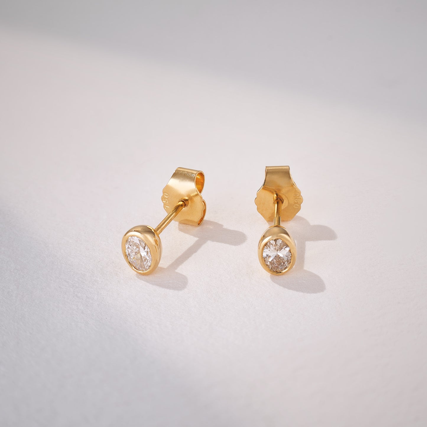 Oval Cut Modern 0.45ct Studs in 14ct Yellow Gold