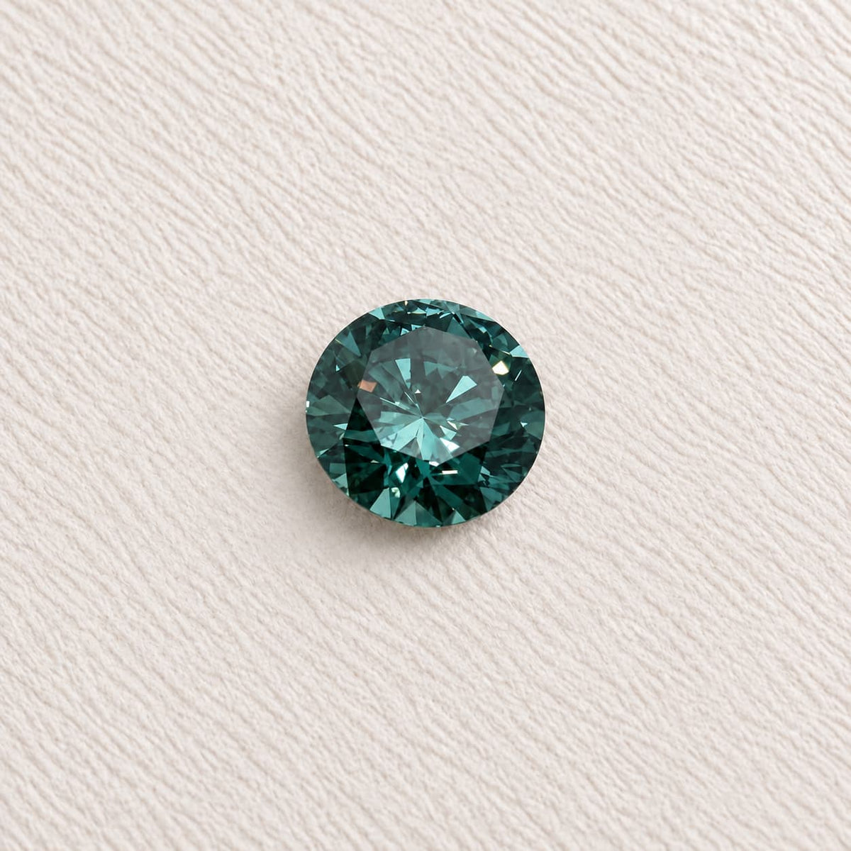 1.01ct Mid Teal SI1 Round Brilliant Skydiamond