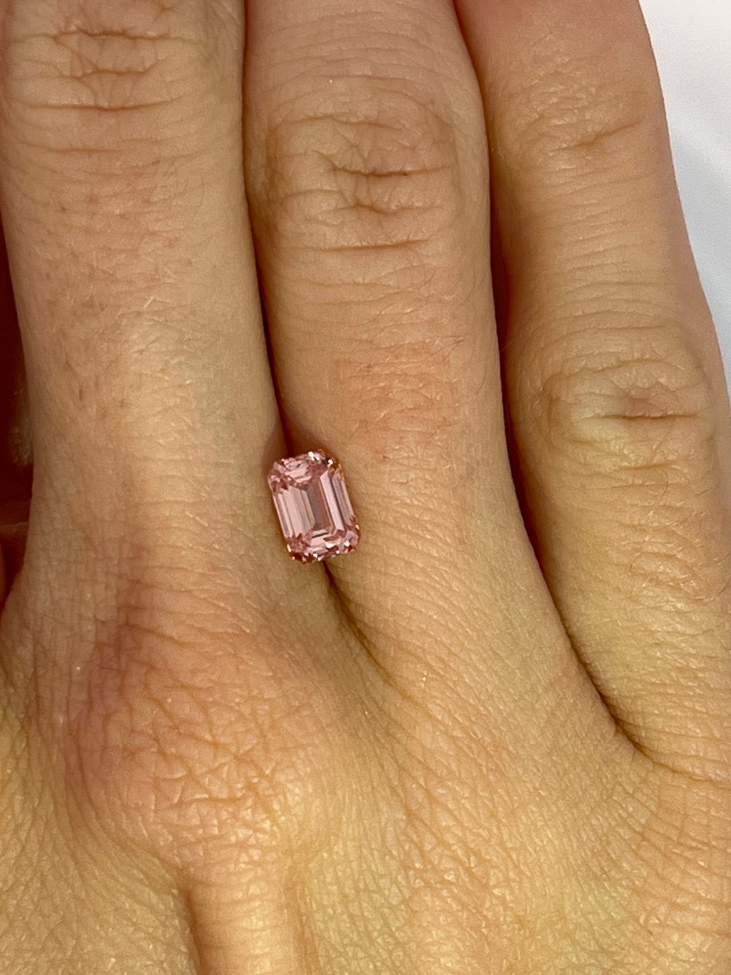 1.11 Carat Orangey-Pink Emerald Skydiamond