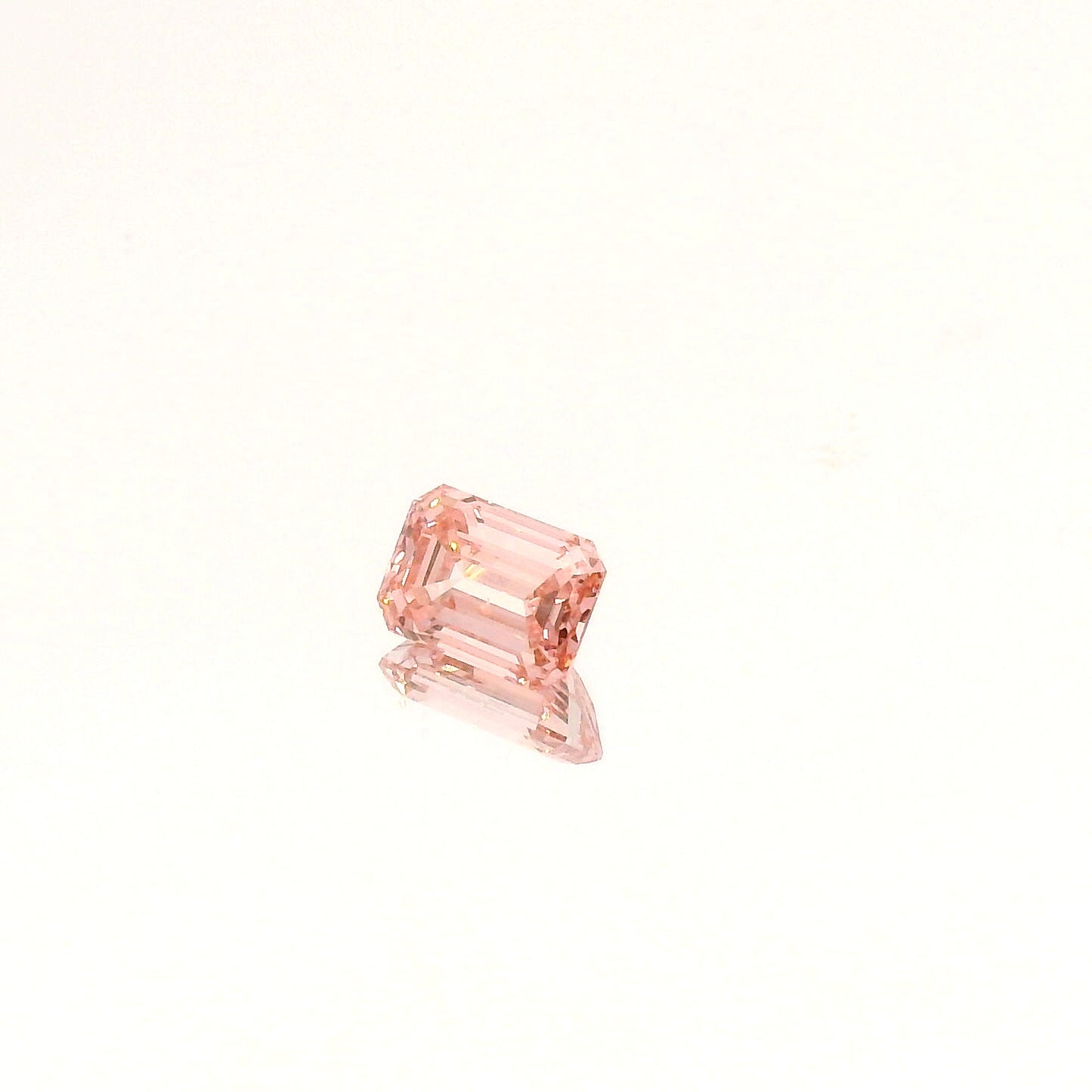 1.11 Carat Orangey-Pink Emerald Skydiamond