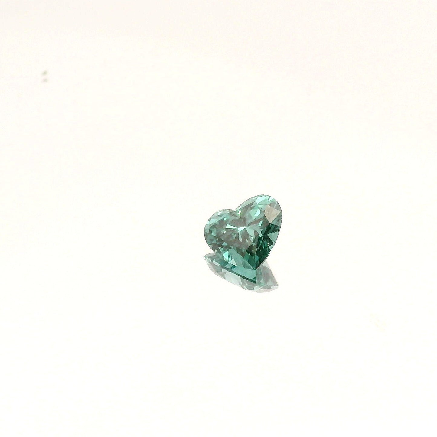 0.76 Carat Teal Heart Skydiamond